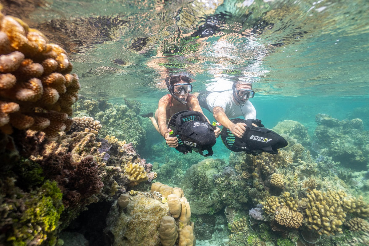 Snorkeling in couple with jet propeller in Bora Bora